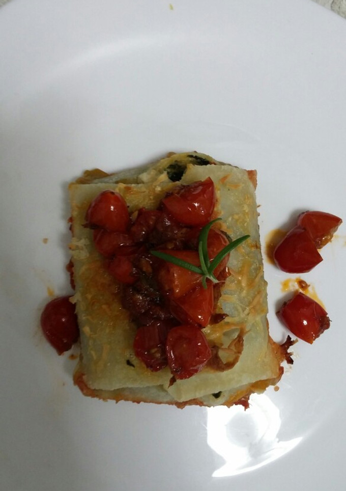 Una foto de Canelones de acelga