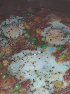 Una foto de Huevos a la flamenca o al plato
