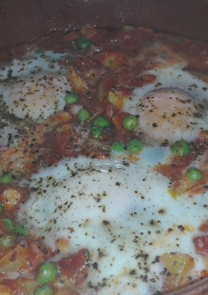 Una foto de Huevos a la flamenca o al plato