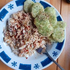 A picture of Tuna and rice savory, spicy warm salad.