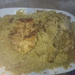 A picture of Sajji with rice.