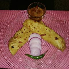 A picture of Spicy stuff onion paratha.