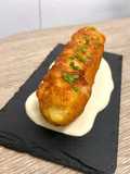 Cordón Blue de pollo en cama de salsa Roquefort
