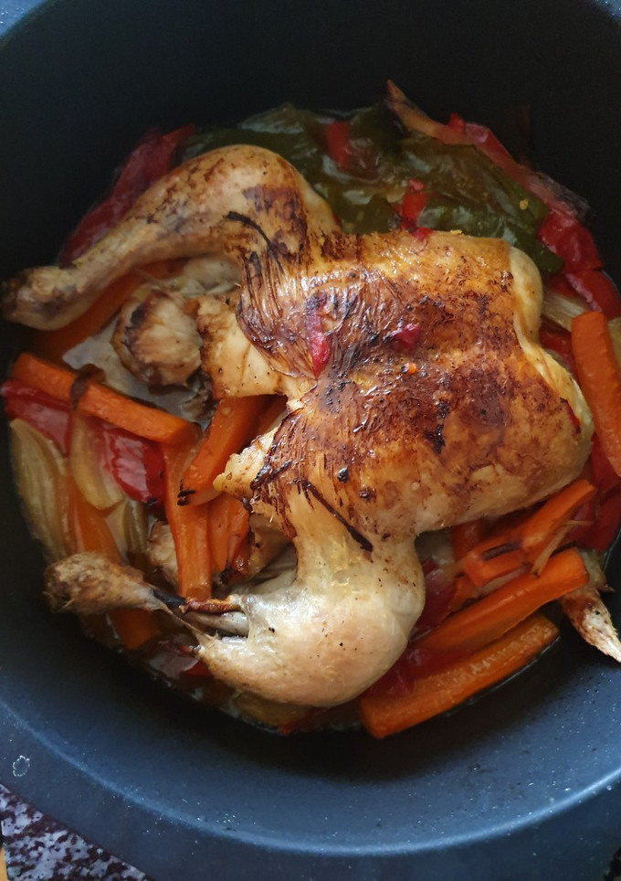 Una foto de Pollo con verduras al horno