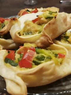 Una foto de Canastitas de zapallito, pollo y queso