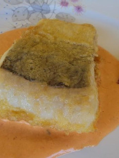 Una foto de Merluza en salsa de piquillos
