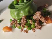 Una foto di ravioli di zucca