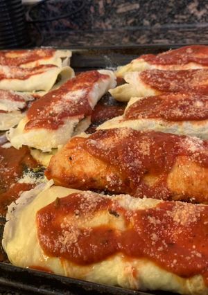 Una foto de Canelones de pollo y espinaca