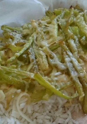 Una foto de Arroz gratinado, con pimientos verdes