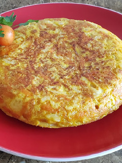 Una foto de Tortilla de coliflor y zanahoria