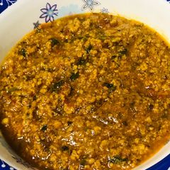 A picture of One pot mins tomato curry.