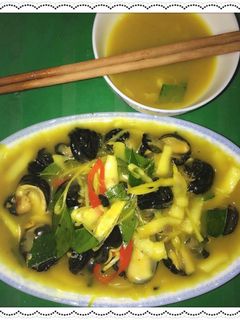Hình của món Ốc nhồi xào măng dừa.
