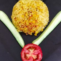 A picture of ChanaDal Fried rice & Cucumber Raita.