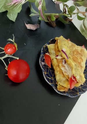 صورة لوصفة اومليت بالبصل. وطماطم 🍅