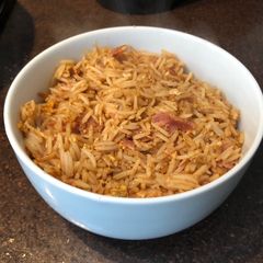 A picture of Egg fried rice with ham.