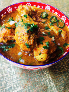 A picture of Kolhapuri Chicken Curry.