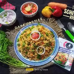 A picture of Vegetable Schezwan Rice.