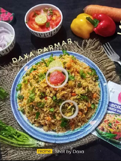 A picture of Vegetable Schezwan Rice.