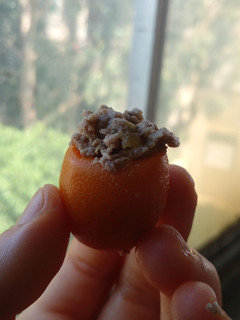 Una foto de Kumquat / quinoto relleno salado