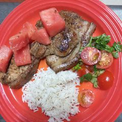 A picture of Country-Style Chops With Quick-Pickled Watermelon.