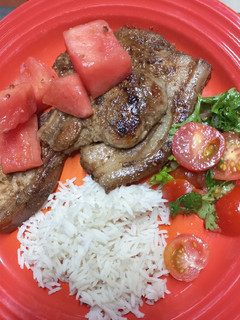 A picture of Country-Style Chops With Quick-Pickled Watermelon.