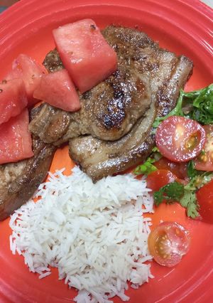 A picture of Country-Style Chops With Quick-Pickled Watermelon.