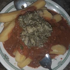 A picture of Matoke and ground nuts stew.