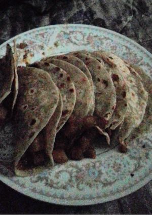 Una foto de Papas con milanesa en salsa toreada
