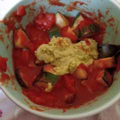 A picture of Tomato and cucumber salad.