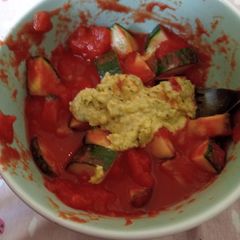 A picture of Tomato and cucumber salad.