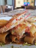 Calamarata con Granchio, Pelati Paprika Granella di Pistacchio