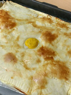 Una foto de Empanada de jamón york y queso