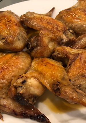 A picture of Baked chicken wing with Shoyu and lemon.