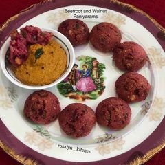 A picture of Beetroot and Walnut Paniyarams.