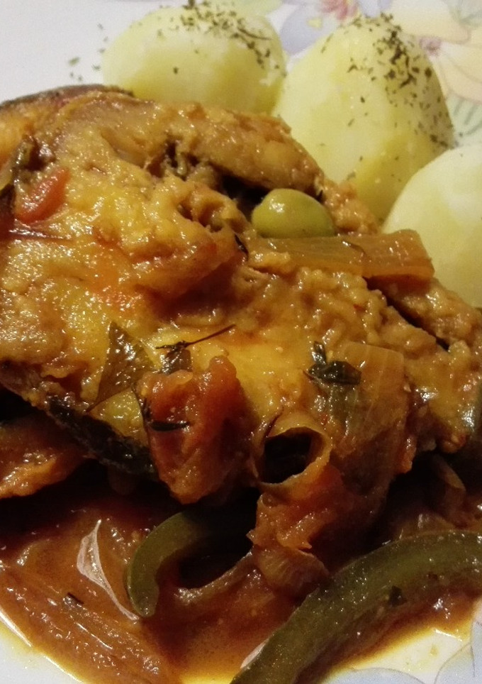 Una foto de Merluza encebollada