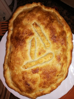Una foto de Empanada de la casa