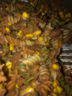 A picture of Easy beef and noodles with corn.
