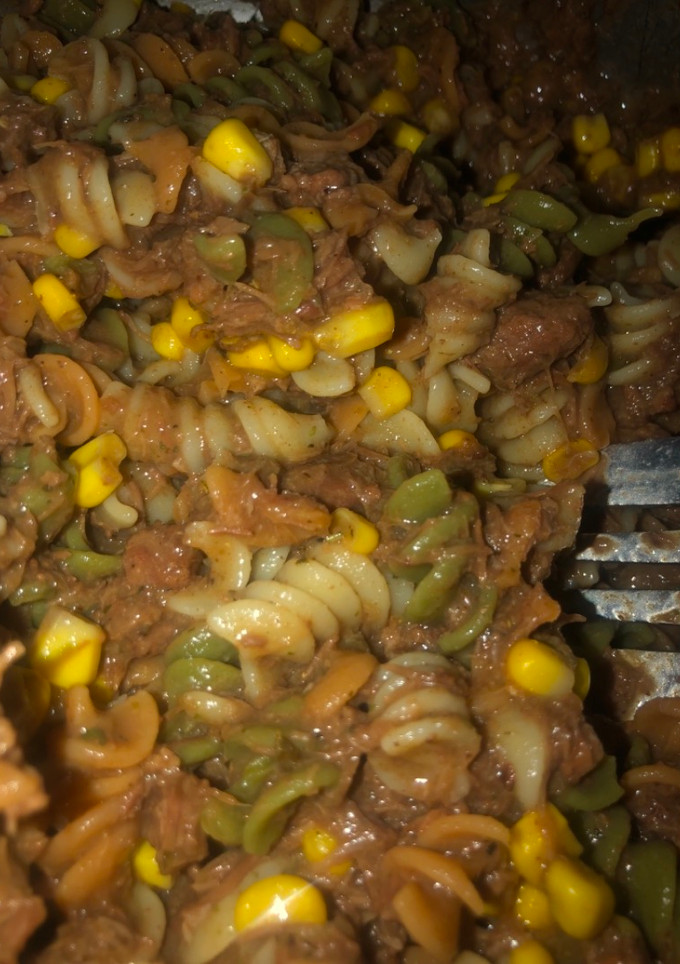 A picture of Easy beef and noodles with corn.