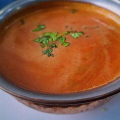 A picture of TANGY, SWEET & SOUR TOMATO-COCONUT MILK SOUP - TOMATO SAAR.