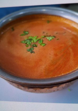 A picture of TANGY, SWEET & SOUR TOMATO-COCONUT MILK SOUP - TOMATO SAAR.