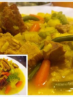 Una foto de Sopa de Arroz con verduras, costillas y lomo de Orza