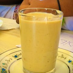 A picture of Delicious kenkey and banana smoothie.