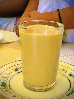 A picture of Delicious kenkey and banana smoothie.