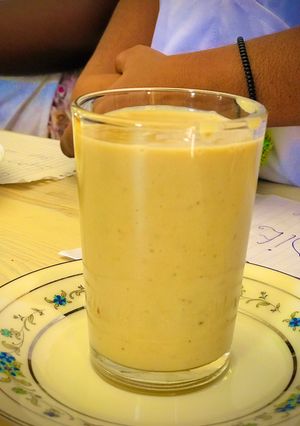 A picture of Delicious kenkey and banana smoothie.