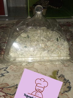 A picture of Cabbage and cucumber salad.
