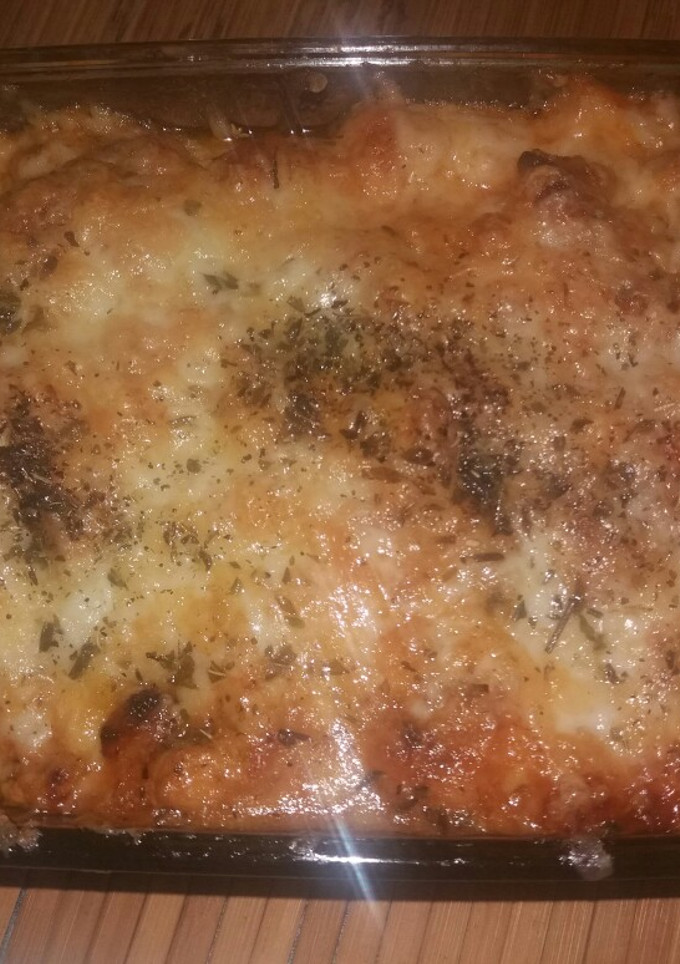 Una foto de Coliflor, tomate y pollo gratinados