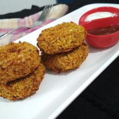A picture of Zucchini-Chickpea Tikki in air fryer.