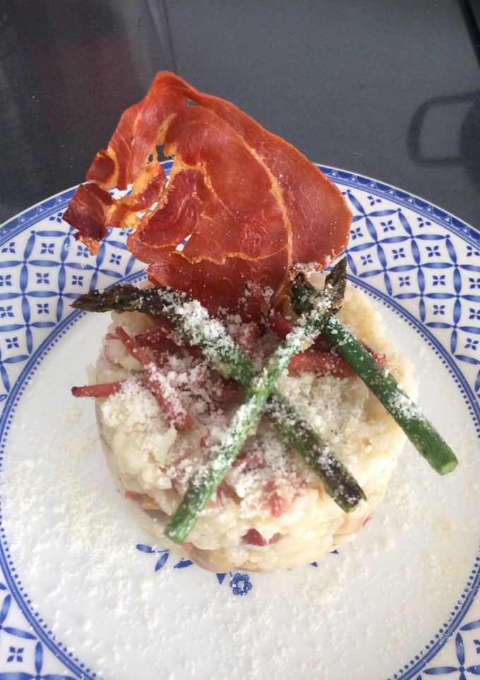 Una foto de Risotto con champis y jamón con peineta