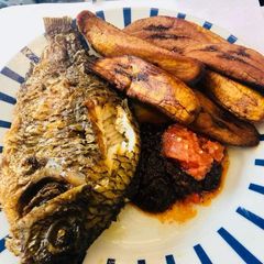 A picture of Fried plantain with grilled fish.
