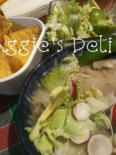Una foto de Pozole de puerco con cabeza